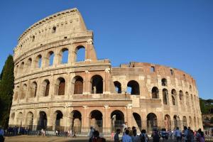 a group of people standing in front of the coliseum at Peter giardino e casa sul lago in Bracciano +34 photos