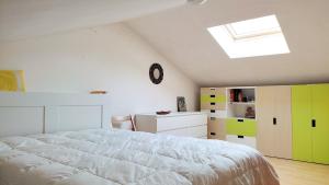 Postel nebo postele na pokoji v ubytování Peter giardino e casa sul lago