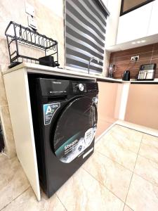 Kuchyň nebo kuchyňský kout v ubytování Mo Apartment + 15 fotografií