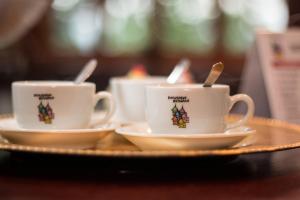 Comodidades para preparar café e chá em Pousada Bonani