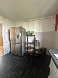 Kuchyň nebo kuchyňský kout v ubytování Chambre double chez habitant