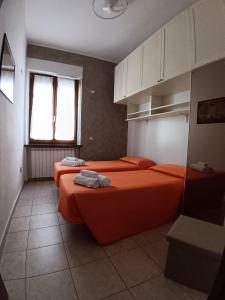 Ένα ή περισσότερα κρεβάτια σε δωμάτιο στο Casa Lo