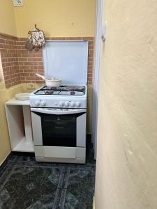 Η κουζίνα ή μικρή κουζίνα στο DEI Stay Apartament Tirana +8 φωτογραφίες