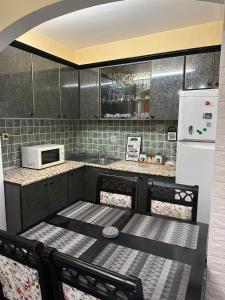 Η κουζίνα ή μικρή κουζίνα στο DEI Stay Apartament Tirana