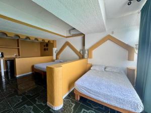 Gallery image of Suites Omega Torres Gemelas in Acapulco +2 photos