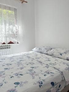 Ένα ή περισσότερα κρεβάτια σε δωμάτιο στο Apartment Green Heaven