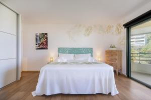 Ένα ή περισσότερα κρεβάτια σε δωμάτιο στο Ava Lodge - Studio dans résidence avec piscine +4 φωτογραφίες