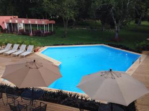 Kolam renang di atau dekat dengan Hotel Chichen Itza