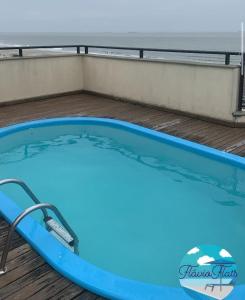 Kolam renang di atau dekat dengan Flat-Veraneio Vista Mar