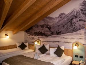 Ένα ή περισσότερα κρεβάτια σε δωμάτιο στο Hotel Daniela