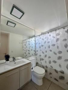 Ванная комната в Beachfront apartment, La Herradura beach
