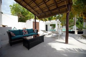 Χώρος καθιστικού στο Casa Hokol penthouse departamento con alberca
