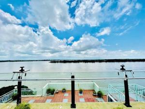 a view of the water from the deck of a boat at Four Rivers Hotel in Stœ̆ng Trêng
