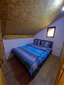 Una cama o camas en una habitación de Achak