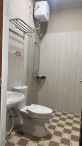 Phòng tắm tại Sinok Homestay Parapat