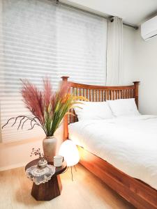 Postel nebo postele na pokoji v ubytování Stay Gachi- Myeongil Station 4min