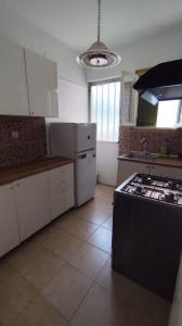 Η κουζίνα ή μικρή κουζίνα στο Appartement Near Beach & Center