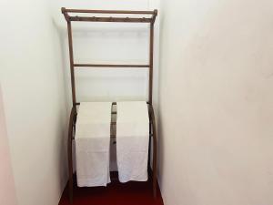 Ένα ή περισσότερα κρεβάτια σε δωμάτιο στο Janaka's House
