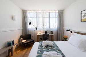Postel nebo postele na pokoji v ubytování Lily & Bloom Boutique Hotel