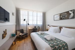 Postel nebo postele na pokoji v ubytování Lily & Bloom Boutique Hotel