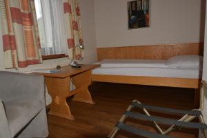 Voodi või voodid majutusasutuse Hotel Terminus toas