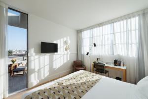 Postel nebo postele na pokoji v ubytování Lily & Bloom Boutique Hotel