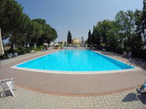 The swimming pool at or close to Camping Village Mar y Sierra
