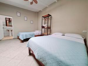 Ένα ή περισσότερα κρεβάτια σε δωμάτιο στο Mini departamento playero - Pacasmayo