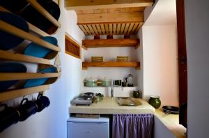 A kitchen or kitchenette at Lindos Esel Suites
