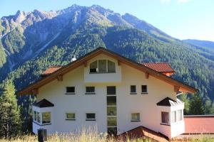 Nespecifikovaný výhled na hory nebo výhled na hory při pohledu z apartmánu