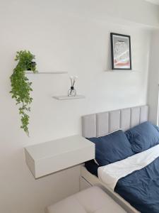 Postel nebo postele na pokoji v ubytování Condo Staycation in Pasig - La Velana Hometel + 5 fotografií