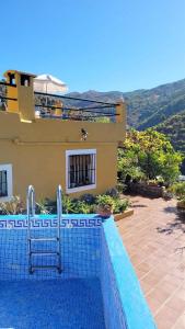 Bazén v ubytování Cortijo Buenavista nebo v jeho okolí