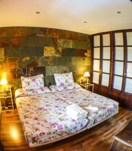 Posteľ alebo postele v izbe v ubytovaní Green Peaks B&B Country House Alojamiento Rural