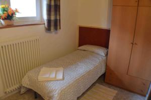 Postel nebo postele na pokoji v ubytování Residence Arvinei