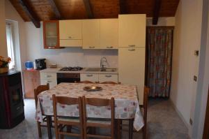 Kuchyň nebo kuchyňský kout v ubytování Residence Arvinei