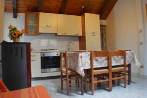 Kuchyň nebo kuchyňský kout v ubytování Residence Arvinei
