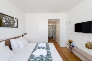 Postel nebo postele na pokoji v ubytování Lily & Bloom Boutique Hotel