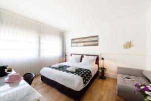 Postel nebo postele na pokoji v ubytování Lily & Bloom Boutique Hotel