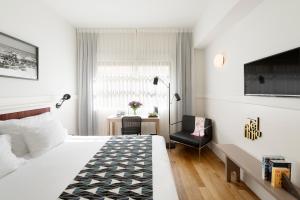 Postel nebo postele na pokoji v ubytování Lily & Bloom Boutique Hotel