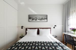 Postel nebo postele na pokoji v ubytování Lily & Bloom Boutique Hotel