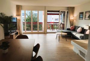 Et opholdsområde på Top duplex Apartment Zurich-Limmattal