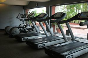 a row of exercise bikes in a gym at Taj MG Road Bengaluru in Bangalore