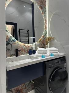 Ένα μπάνιο στο Tashkent City Downtown Deluxe Host Apartments