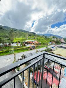 a view of a city from a balcony at Rich field Cameron Highlands Homestay-Peony Square-3BDR 2BTH-8PAX in Cameron Highlands
