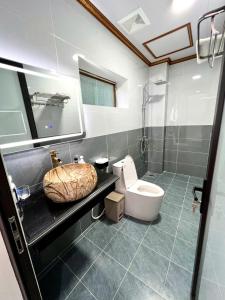 Koupelna v ubytování Trang An Haven & Tranquil Homestay + 30 fotografií