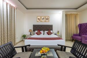 Giường trong phòng chung tại Hotel Amaara Stayz- Sector 39, Medanta Hospital