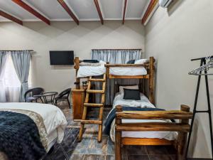 Ένα ή περισσότερα κρεβάτια σε δωμάτιο στο Jabali Guest House