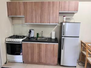 Kuchyň nebo kuchyňský kout v ubytování New 1BR in Mandaluyong