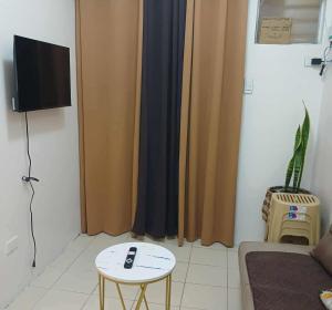 Μια τηλεόραση ή/και κέντρο ψυχαγωγίας στο Cozy City Stay in Baguio
