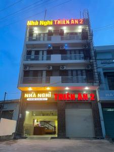 a building with a sign that reads nima north then an then at Thiên Ân 2 MOTEL in Kon Rung (1)